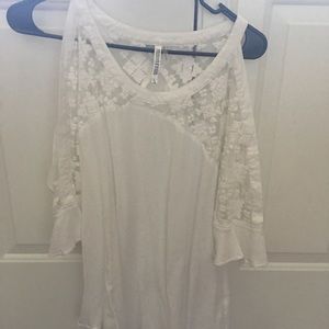 White Top with the shoulders showing.